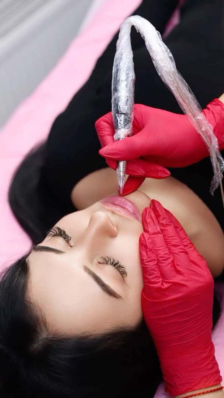 Close-up of a client receiving cosmetic eyebrow treatment