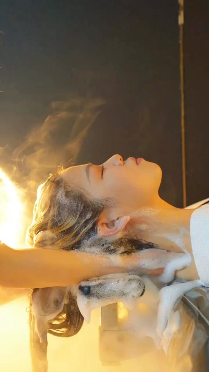 A woman getting a neck massage