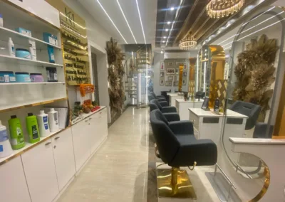 The modern and stylish interior of KM Orgatonics salon and clinic in Gorakhpur, featuring salon chairs, product displays, and elegant decor.